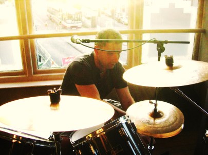 Derek setting up the kit for Tonight Live Not Completely Sold Out