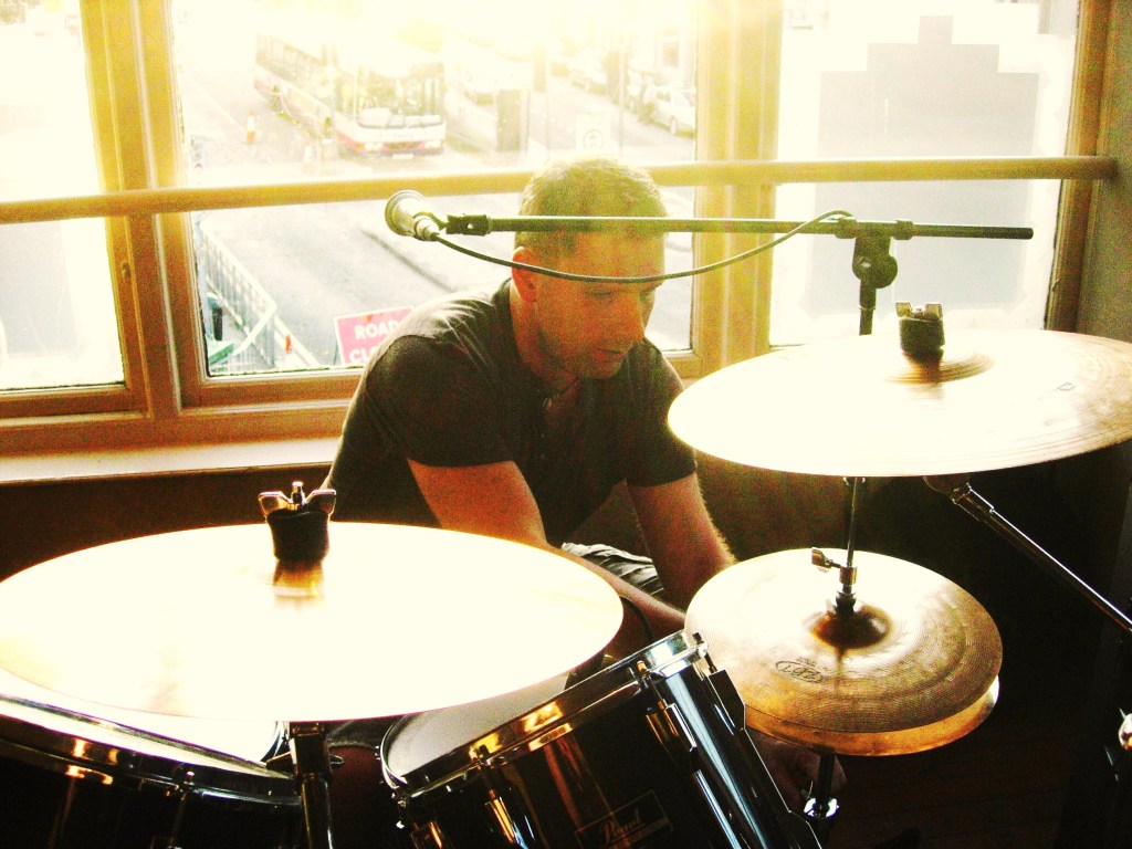 Derek setting up the kit for Tonight Live Not Completely Sold Out