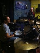 We were recording practices by this time, trying to get the best set up for the drums as we would record the kit in this very room