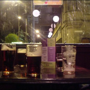 Drinks on the cover and drinks in the album. This is a wee table in the quiet corner of Firkins